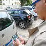 Un’automobilista alle prese con il l'utilizzo dell'app. Foto Brisotto/Petrussi
