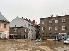 epa11606607 Damages on flooded streets after heavy rainfalls in Glucholazy, southwestern Poland, 15 September 2024. The southern regions of Poland are experiencing record rainfall and severe flooding caused by heavy rains from the Genoese depression "Boris", which reached Poland on Thursday, September 12. People in flooded areas of the region are being forced to evacuate, and water is flooding villages and towns. River levels are at or above alarming levels. Poland's prime minister confirmed on September 15 that one person had died as a result of the flooding. EPA/MICHAL MEISSNER POLAND OUT