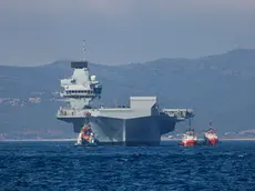 epa09328199 A handout picture provided by the UK Ministry of Defence shows the HMS Prince of Wales arriving in Gibraltar, 06 July 2021 (issued 07 July 2021). The Royal Navy aircraft carrier has made its first overseas port visit in Gibraltar. EPA/Mark Johnson/BRITISH MINISTRY OF DEFENCE/HANDOUT MANDATORY CREDIT: MOD/CROWN COPYRIGHT HANDOUT EDITORIAL USE ONLY/NO SALES