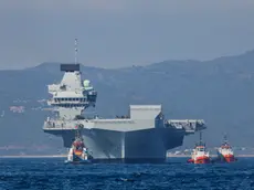 epa09328199 A handout picture provided by the UK Ministry of Defence shows the HMS Prince of Wales arriving in Gibraltar, 06 July 2021 (issued 07 July 2021). The Royal Navy aircraft carrier has made its first overseas port visit in Gibraltar. EPA/Mark Johnson/BRITISH MINISTRY OF DEFENCE/HANDOUT MANDATORY CREDIT: MOD/CROWN COPYRIGHT HANDOUT EDITORIAL USE ONLY/NO SALES