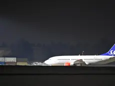 epa11197479 The MEDEVAC plane with Norway's King Harald on board arrives at Oslo Airport Gardermoen, Norway, 03 March 2024. The aircraft of the Scandinavian Airlines (SAS) was requisitioned by the Norwegian Armed Forces and used to bring the 87-year-old king home after he fell ill while on vacation in Malaysia and was hospitalized on the island of Langkawi Island, state of Kedah, Malaysia. EPA/Annika Byrde NORWAY OUT