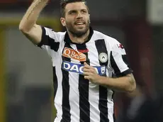 Udinese defender Maurizio Domizzi, right, celebrates after scoring during the Serie A soccer match between Inter Milan and Udinese at the San Siro stadium in Milan, Italy, Sunday, May 19, 2013. (AP Photo/Antonio Calanni)