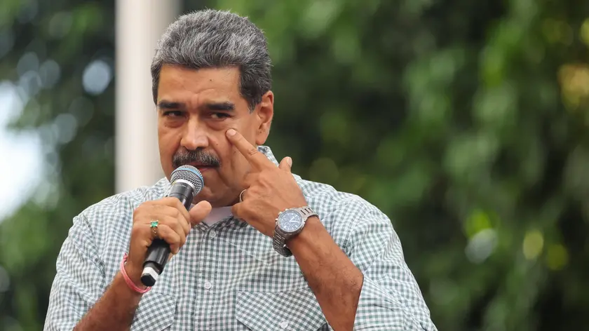 epa11570312 Venezuelan President, Nicolas Maduro, speaks to his followers in Caracas, Venezuela, 28 August 2024. Chavista supporters celebrated on 28 August in the streets of Venezuela the re-election of President Nicolas Maduro in the elections held a month ago, as Venezuelan opposition leader Maria Corina Machado also held a rally in Caracas protesting against the official results of Venezuela's presidential elections, and claiming the victory of Edmundo Gonzalez Urrutia. EPA/MIGUEL GUTIERREZ