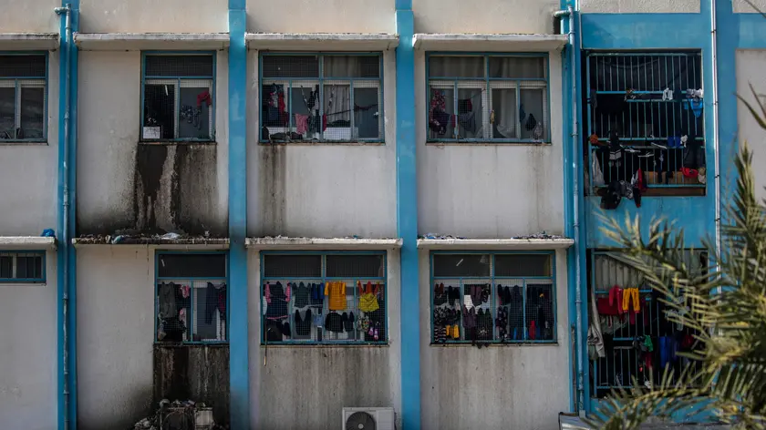 epa11131164 Clothes of Palestinian families who have fled from the northern Gaza Strip, hang out to dry at the Unrwa school in Deir Al Balah, southern Gaza Strip, 06 February 2024. More than 27,000 Palestinians and over 1,300 Israelis have been killed, according to the Palestinian Health Ministry and the Israel Defense Forces (IDF), since Hamas militants launched an attack against Israel from the Gaza Strip on 07 October 2023, and the Israeli operations in Gaza and the West Bank which followed it. EPA/MOHAMMED SABER