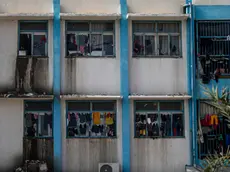 epa11131164 Clothes of Palestinian families who have fled from the northern Gaza Strip, hang out to dry at the Unrwa school in Deir Al Balah, southern Gaza Strip, 06 February 2024. More than 27,000 Palestinians and over 1,300 Israelis have been killed, according to the Palestinian Health Ministry and the Israel Defense Forces (IDF), since Hamas militants launched an attack against Israel from the Gaza Strip on 07 October 2023, and the Israeli operations in Gaza and the West Bank which followed it. EPA/MOHAMMED SABER