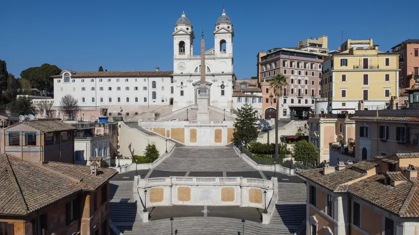 (Photo taken with a drone) Trinità dei Monti at Piazza di Spagna is deserted during the Coronavirus emergency lockdown in Rome, Italy, 2 and 3 April 2020. Police and soldiers are deployed across the country to ensure that citizens comply with the stay-at-home orders in a bid to slow down the wide spread of the pandemic COVID-19 disease. ANSA/ALESSANDRO DI MEO