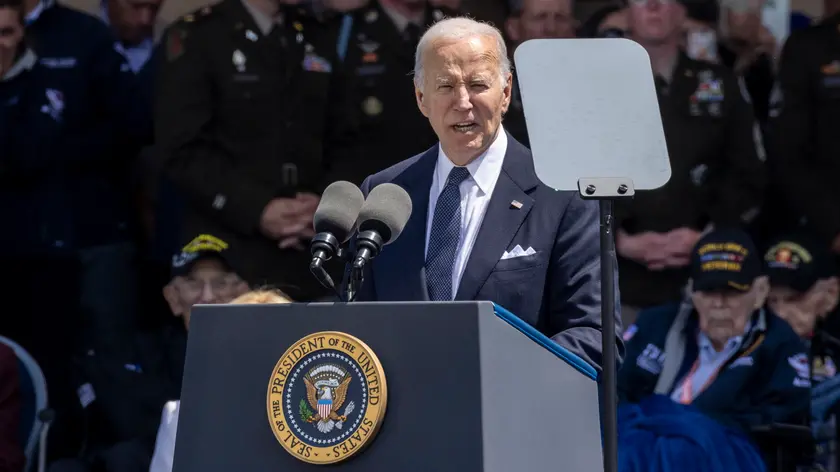 epa11394626 US President Joe Biden delivers a speech during the commemorative ceremony for the 80th anniversary of D-Day landings in Normandy at American War Cemetery in Colleville-sur-Mer, France, 06 June 2024. More than 160,000 Western allied troops landed on beaches in Normandy on 06 June 1944 launching the liberation of Western Europe from Nazi occupation during World War II. EPA/ANDRE PAIN