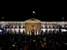 epa11128265 General view of the National Palace with supporters coming to listen to the current president and re-election winner, Nayib Bukele, who speaks with his wife Gabriela Rodriguez de Bukele in San Salvador, El Salvador, 04 February 2024. The preliminary count of the presidential elections in El Salvador gives an overwhelming victory to Nayib Bukele with 1,090,522 votes for his party, Nuevas Ideas (NI), well ahead of the Farabundo Marti National Liberation Front (FMLN, left) with 93,846, and the Nationalist Republican Alliance (Arena, right), with 81,102, according to data released by the Supreme Electoral Tribunal (TSE), which must be ratified in final scrutiny. EPA/Rodrigo Sura