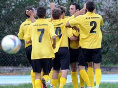 Fagagna 25 Agosto 2013. Coppa Italia Dilettanti. Fagagna (maglia rosso nera) - Flaibano (maglia gialla). Gol ed esulti gol del vantaggio numero 9 del Flaibano. Telefoto Copyright Petrussi Foto Press / Diego Petrussi