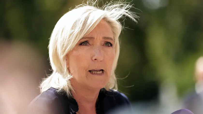 epa11565320 French far right party Rassemblement National (RN) leader at the National Assembly Marine Le Pen speaks to the media after a meeting hosted by French president with leaders of the parliamentary groups at Elysee Palace in Paris, France, 26 August 2024. Last Friday, on 23 August, the French President started different consultations with leaders of political groups represented in the National Assembly to appoint a new prime minister after the resignation of Gabriel Attal's government on 16 July. EPA/TERESA SUAREZ