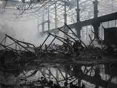 epa11047967 Ukrainian rescuers work at the site of a rocket attack on a civilian warehouse in Kyiv (Kiev), Ukraine, 29 December 2023, amid the Russian invasion. At least 16 people have died and dozens more injured after Russia launched a wave of airstrikes across Ukraine, Ukrainian authorities said on 29 December. Strikes were reported in Kyiv, Lviv, Odesa, Dnipro, Kharkiv, Zaporizhzhia, and other Ukrainian cities. Russia launched 'more than 150 missiles and combat drones' at Ukrainian cities, Ukraine's Prosecutor General Andriy Kostin said in a statement, adding that extensive damage included residential buildings, educational institutions and hospitals. Russian troops entered Ukraine on 24 February 2022 starting a conflict that has provoked destruction and a humanitarian crisis. EPA/OLEG PETRASYUK