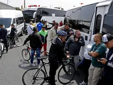 epa11582668 Transporters block road intersections in protest against the increase in diesel prices, in Bogota, Colombia, 03 September 2024. Buses and other heavy vehicles joined the protests carried out by truck drivers on several of the country's main roads and at the exits of the capital due to the increase in fuel prices, mainly diesel, which began to take effect on 31 August 2024. EPA/MAURICIO DUENAS CASTANEDA
