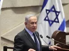 epa11166728 Israeli Prime Minister Benjamin Netanyahu speaks during the voting session for the impeachment of Hadash-Ta’al party MP Ofer Cassif in Jerusalem, 19 February 2024. The motion was brought up after Cassif publicly supported South Africa’s genocide case against Israel at the International Court of Justice (ICJ). EPA/ABIR SULTAN
