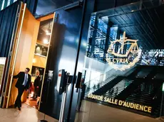 epa10066472 A guard closes the door of the Grand Salle inside the Court of Justice of the European Union (CJEU) in Luxembourg, 12 July 2022, after a break in the hearing of the European Super League case. In April 2021 Barcelona, Juventus and Real Madrid, three of the original twelve founding members of the European Super League, won a ruling by a Spanish court that the clubs could not be punished by the UEFA or FIFA for setting up the league. The court in Madrid referred the case to the CJEU. The three clubs, representing European Super League Company, S.L., claim that UEFA and FIFA abuse their dominant position and act against EU competition law. EPA/MOHAMMED BADRA
