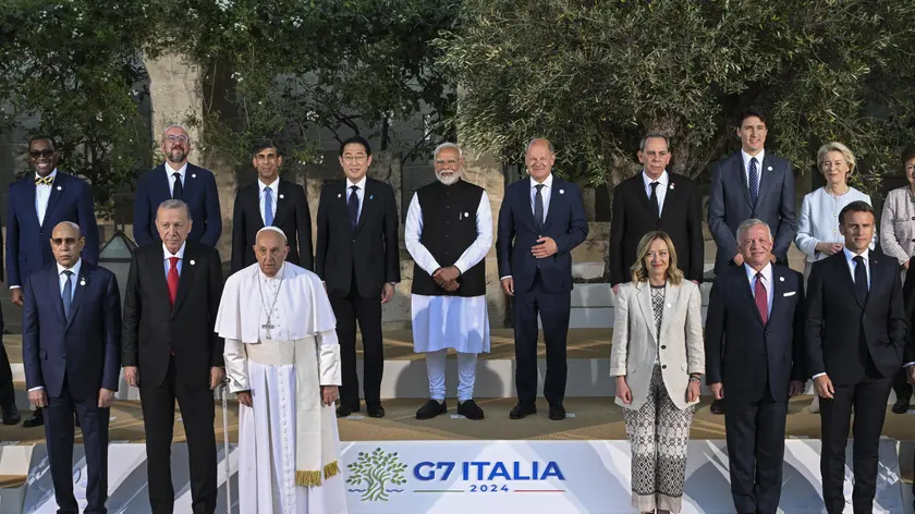 epa11410811 G7 heads of states and heads of delegation of outreach countries pose for a group photo during the second day of the G7 Summit in Borgo Egnazia, Italy, 14 June 2024. Back row (L-R) African Development Bank (AFDB) President Akinwumi Adesina, European Council President Charles Michel, British Prime Minister Rishi Sunak, Japan's Prime Minister Fumio Kishida, Indian Prime Minister Narendra Modi, German Chancellor Olaf Scholz, Tunisian President Ahmed Hachani, Canadian Prime Minister Justin Trudeau, European Commission President Ursula von der Leyen. Front row (L-R) Mauritania President Mohamed Ould Ghazouani, Turkish President Recep Tayyip Erdogan, Pope Francis, Italian Prime Minister Giorgia Meloni, King Abdallah II of Jordan, French President Emmanuel Macron. The 50th G7 summit brings together the Group of Seven member states leaders in Borgo Egnazia resort in southern Italy from 13 to 15 June 2024. EPA/CIRO FUSCO