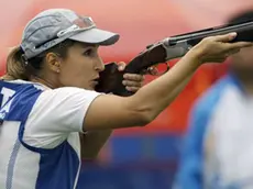 Italy's Chiara Cainero shoots during the women's skeet final shooting event at the Beijing 2008 Olympics in Beijing, Thursday, Aug. 14, 2008. Cainero won the gold medal. (AP Photo/Sergey Ponomarev)