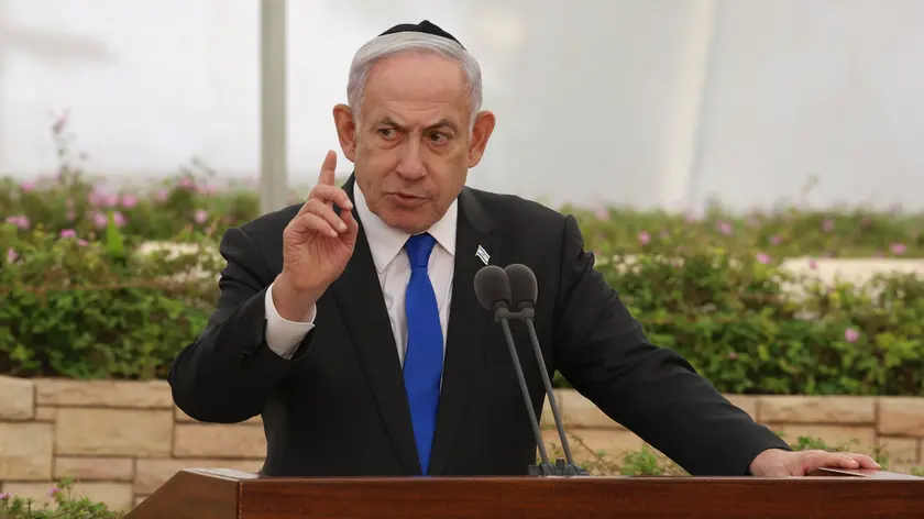 epa11420061 Israeli Prime Minister Benjamin Netanyahu attends the state memorial ceremony for the victims of the 1948 'Altalena Affair', at the Nahalat Yitzhak Cemetery in Tel Aviv, Israel, 18 June 2024. The weapons-laden cargo ship Altalena was involved in violent confrontations that erupted in June 1948 between the newly created Israel Defense Forces and the Irgun, a Jewish paramilitary group, during the process of absorbing all military organizations into the IDF following Israel’s declaration of independence a month earlier. At least 16 people were killed in the confrontations. EPA/Shaul Golan / Yedioth Ahronoth POOL