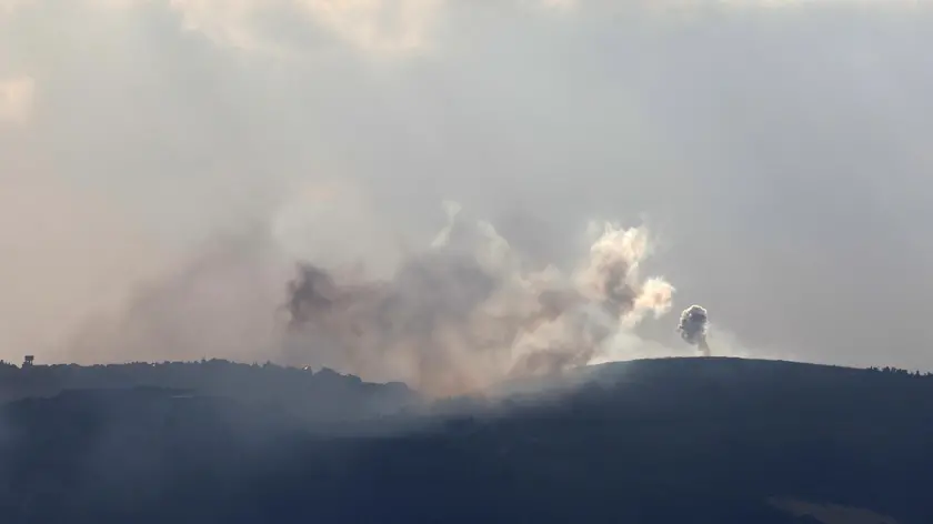 epa11619262 Smoke rises as a result of an Israeli airstrike on the south Lebanon village of Markaba, as seen form the Upper Galilee, northern Israel, 22 September 2024. The Israeli military said that about 85 projectiles were identified crossing from Lebanon into several areas in northern Israel on 22 September. Some of the shells were intercepted, and fallen projectiles were located in Kiryat Bialik, Tsur Shalom and Moreshet, igniting fires in the area, the statement added. There are no casualties in the incident. Following the attack on northern Israel the Israel Defense Forces (IDF) said it conducted strikes against Hezbollah targets in Lebanon. EPA/ATEF SAFADI