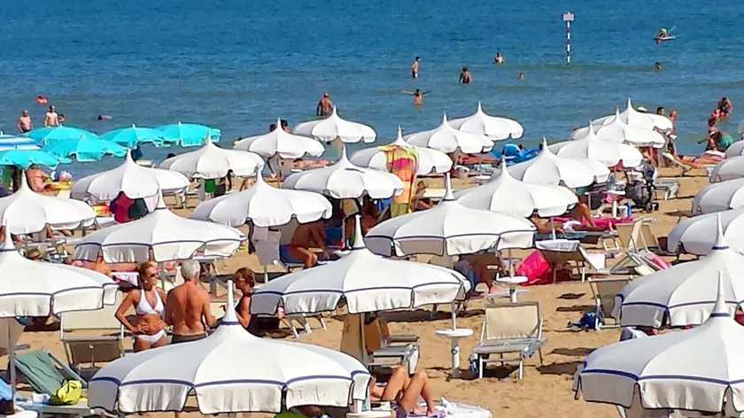 Lignano 17 Agosto 2014. Spiaggia a Pineta. © Petrussi Foto Press Srl Udine