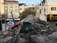 epa11358666 Rubble in a square damaged by an Israeli bulldozer during an Israeli army raid in the Jenin refugee camp, 21 May 2024. At least seven Palestinians including a doctor, a schoolteacher and two students, were killed and at least nine others injured on 21 May, after an Israeli army operation in the West Bank city of Jenin and its camp. EPA/ALAA BADARNEH