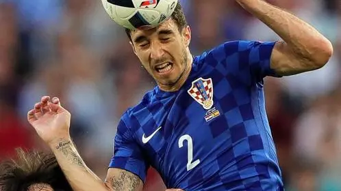 epa05382288 David Silva (L) of Spain in action against Sime Vrsaljko (R) of Croatia during the UEFA EURO 2016 group D preliminary round match between Croatia and Spain at Stade de Bordeaux in Bordeaux, France, 21 June 2016...(RESTRICTIONS APPLY: For editorial news reporting purposes only. Not used for commercial or marketing purposes without prior written approval of UEFA. Images must appear as still images and must not emulate match action video footage. Photographs published in online publications (whether via the Internet or otherwise) shall have an interval of at least 20 seconds between the posting.) EPA/ARMANDO BABANI EDITORIAL USE ONLY