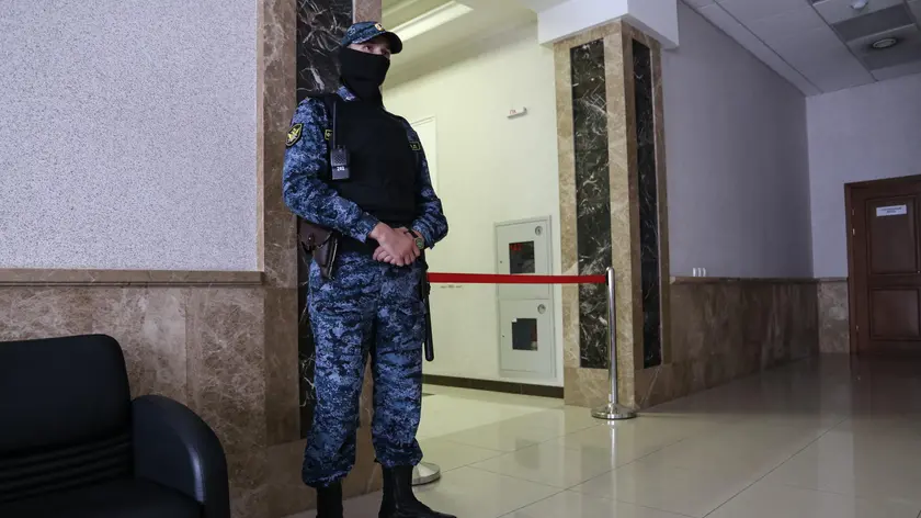 epa11484909 An armed guard stand in the court during hearing a case against the Wall Street Journal (WSJ) correspondent Evan Gershkovich in Yekaterinburg's Sverdlovsk Regional Court, Yekaterinburg, Russia, 18 July 2024. Evan Gershkovich, a US journalist of The Wall Street Journal covering Russia, was detained in Yekaterinburg on 29 March 2023. The Russian Federal Security Service (FSB) claimed that on the instructions of the American authorities, the journalist collected information constituting a state secret about one of the enterprises of the Russian military-industrial complex. He is charged with espionage under Art. 276 of the Criminal Code of the Russian Federation, which could carry a sentence of up to 20 years. Others are not identified. EPA/STRINGER