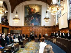 epa11345188 The judges enter the courtroom during a hearing at the International Court of Justice (ICJ) on the situation in Gaza's Rafah, at the Peace Palace in The Hague, Netherlands, 16 May 2024. The ICJ is holding a two-day public hearing on the request filed by South Africa seeking additional provisional measures over Israeli assault on Gaza's Rafah. EPA/LINA SELG