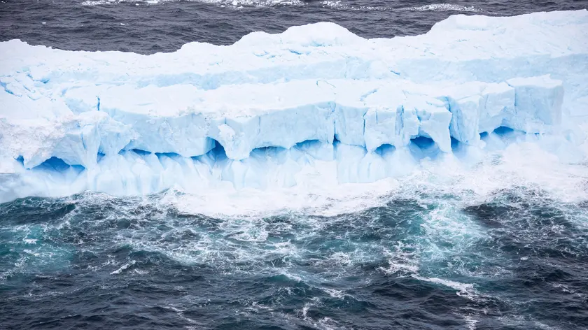 epa08871052 An undated handout picture provided by the British Ministry of Defence (MoD) and taken from an A400M Atlas Royal Air Force (RAF) aircraft shows the first photographic evidence of one of the largest recorded icebergs floating near the island of South Georgia, South Atlantic to where it has transited from Antarctica. With a surface area of approximately 4,200 square kilometres, and longer and wider than South Georgia, and weighing hundreds of billions of tonnes, A68a is the largest section of A68, an iceberg which calved from the Larsen C Ice Shelf on the Antarctic Peninsula in July 2017. Ice debris has already started to break away, caused by A68a drifting through warmer waters near the South Orkney islands. EPA/Cpl Phil Dye RAF/BRITISH MINISTRY OF DEFENCE/HANDOUT MANDATORY CREDIT: MOD/CROWN COPYRIGHT HANDOUT EDITORIAL USE ONLY/NO SALES