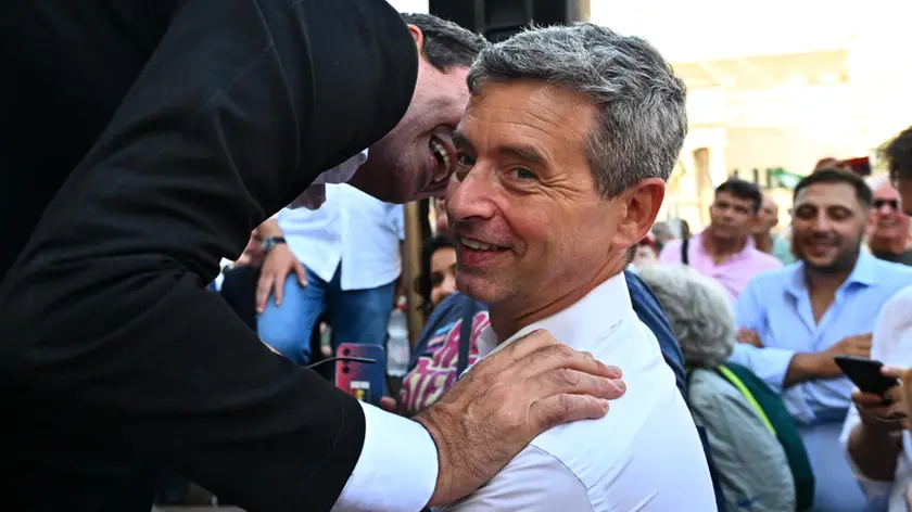 Nicola Fratoianni (S) segretario e leader di Sinistra Italiana e di Alleanza Verdi e Andrea Orlando deputato del Pd ex ministro della Giustizia, durante la manifestazione unitaria del centrosinistra in piazza De Ferrari, per chiedere le dimissioni del presidente agli arresti domiciliari Giovanni Toti dello scorso 18 luglio. Genova, 29 luglio 2024. ANSA/LUCA ZENNARO