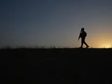 epa10838597 A Kurdish Peshmerga fighter patrols in Altun Kopri town after lifting a curfew that was imposed following deadly protests, on the outskirts of Kirkuk city, Iraq, 03 September 2023. Iraqi authorities lifted a curfew imposed on 02 September following deadly protests that left at least four people dead, according to the Kirkuk police spokesman. The tension in Kirkuk erupted between Kurdish residents on one side and Arab and Turkmen demonstrators who had been staging a sit-in since 28 August near the headquarters of the Iraqi military’s Joint Operations Command (JOC) and blocked Kirkuk-Erbil Road, as they reject an Iraqi government decision to hand over the headquarters to the Kurdistan Democratic Party. EPA/GAILAN HAJI