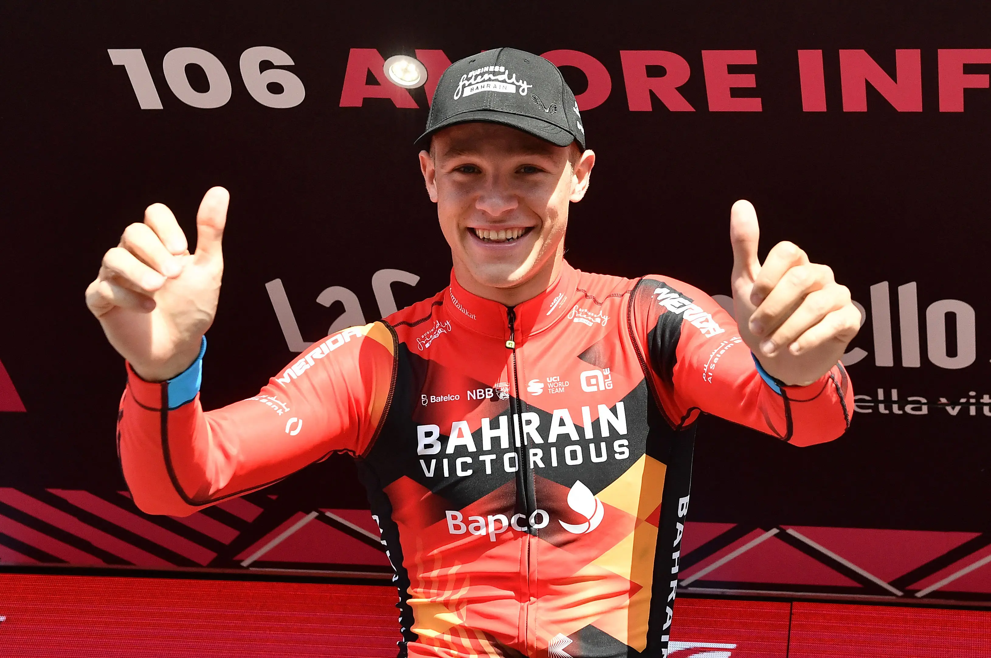 Cycling - Giro d'Italia - Stage 2 - Teramo to San Salvo - Italy - May 7, 2023 Bahrain – Victorious' Jonathan Milan celebrates on the podium after winning stage 2 REUTERS/Jennifer Lorenzini