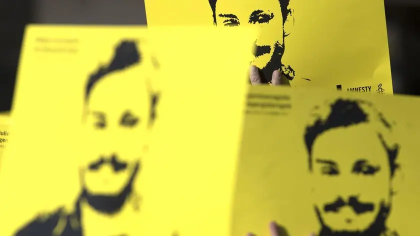 People hold signs depicting Giulio Regeni and reading ''365 days without Giulio'' as they attend a march in memory of the Italian researcher at Sapienza University on the first anniversary of his disappearance in Egypt, Rome, Italy, 25 January 2017. Italian President Sergio Mattarella on the same day called for cooperation to bring the killers of Regeni in Egypt to justice. 'Italy has mourned the killing of one of its studious young people, Giulio Regeni, without full light being shed on this tragic case for a year, despite the intense efforts of our judiciary and our diplomacy', Mattarella said on the first anniversary of Regeni's disappearance. 'We call for broader and more effective cooperation so that the culprits are brought to justice'. Guilio Regeni was an Italian PhD student researching the independent trade unions in Egypt, he disappeared on 25 January 2016 in Cairo, then his body was found in a ditch on Cairo-Alexandria road outside of Cairo on 03 February 2016 with signs of torture. ANSA/MASSIMO PERCOSSI