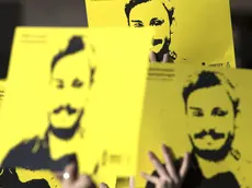 People hold signs depicting Giulio Regeni and reading ''365 days without Giulio'' as they attend a march in memory of the Italian researcher at Sapienza University on the first anniversary of his disappearance in Egypt, Rome, Italy, 25 January 2017. Italian President Sergio Mattarella on the same day called for cooperation to bring the killers of Regeni in Egypt to justice. 'Italy has mourned the killing of one of its studious young people, Giulio Regeni, without full light being shed on this tragic case for a year, despite the intense efforts of our judiciary and our diplomacy', Mattarella said on the first anniversary of Regeni's disappearance. 'We call for broader and more effective cooperation so that the culprits are brought to justice'. Guilio Regeni was an Italian PhD student researching the independent trade unions in Egypt, he disappeared on 25 January 2016 in Cairo, then his body was found in a ditch on Cairo-Alexandria road outside of Cairo on 03 February 2016 with signs of torture. ANSA/MASSIMO PERCOSSI