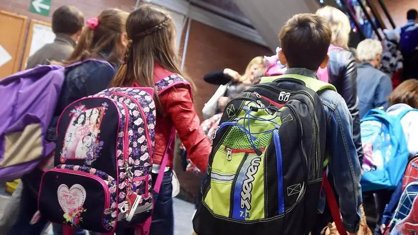 Primo giorno di lezione presso la scuola Elementare Antonelli di Torino, 14 settembre 2015 ANSA/ ALESSANDRO DI MARCO