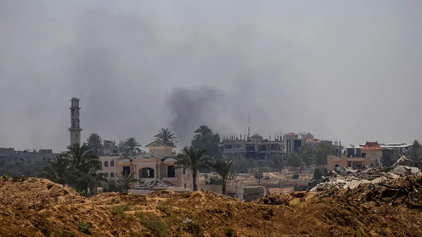 epa11391019 Smoke rises during an Israeli military operation in Al Bureij refugee camp, central Gaza Strip, 05 June 2024. The Israeli military stated on 05 June that Israeli troops started a 'targeted operational activity' in the areas of Bureij and eastern Deir al Balah both 'above and below ground' in the area. More than 36,000 Palestinians and over 1,400 Israelis have been killed, according to the Palestinian Health Ministry and the Israel Defense Forces (IDF), since Hamas militants launched an attack against Israel from the Gaza Strip on 07 October 2023, and the Israeli operations in Gaza and the West Bank which followed it. EPA/MOHAMMED SABER