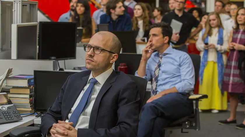 epa05902775 A handout photo made available on 11 April 2017 by the New York Times News Service shows A.G. Sulzberger, (L), deputy publisher, and Sam Dolnick, assistant editor, during a gathering in The New York Times newsroom for the announcement of the 2017 Pulitzer Prizes, in New York, USA, 10 April 2017. The Times won three awards for breaking news photography, feature writing and international reporting. EPA/HIROKO MASUIKE / NYTNS / HANDOUT FOR USE ONLY WITH STORIES ON THE 2017 PULITZER PRIZES - MAGS OUT HANDOUT EDITORIAL USE ONLY/NO SALES/NO ARCHIVES