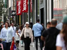 epa11551220 People walk on Oxford Street in London, Britain, 16 August 2024. British retail sales have risen driven by a boost of sales in department stores and sports equipment stores following summer discounts and sporting events. Britain's retail sales rose 0.5 percent in July 2024, following a revised 0.9 per cent contraction in the previous month, the Office for National Statistics reported on 16 August. EPA/ANDY RAIN