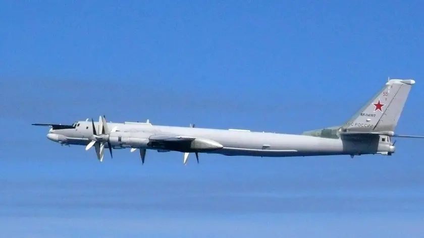 epa07735501 A handout photo made available by the Japanese Defense Ministry on 23 July 2019 shows Russian Aerospace Forces' turboprop-powered strategic bomber Tupolev Tu-95 flying to violate Japanese airspace on 23 July 2019. Japanese Defense Ministry said the Russian Tu-95 violated the airspace. EPA/JAPANESE DEFENSE MINISTRY HANDOUT MANDATORY CREDIT HANDOUT EDITORIAL USE ONLY/NO SALES
