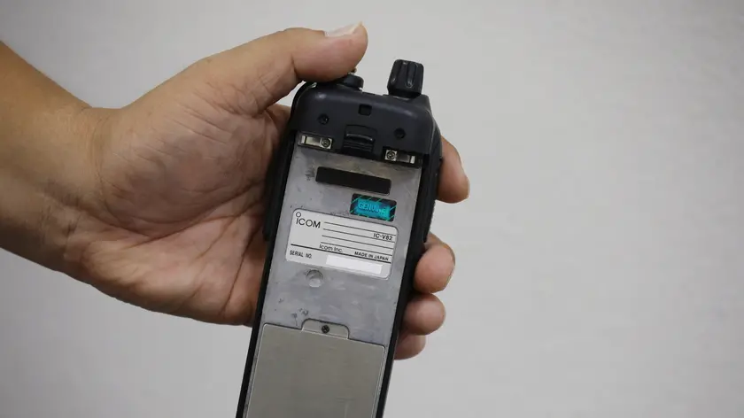 epa11613237 Japanese walkie-talkie maker Icom Inc. director Yoshiki Enomoto shows its radio model IC-V82 device during an interview at the company head office in Osaka, western Japan, 19 September 2024. Japanese firm Icom Inc. announced on its website on 19 September that it was investigating reports that device with the company logo exploded in Lebanon. The company stated that the IC-V82 radio model, reportedly involved in the recent blasts, was discontinued around 10 years ago. EPA/FRANCK ROBICHON