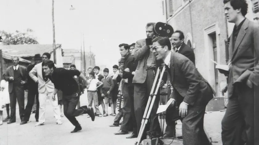 Pier Paolo Pasolini sul set di ''Accattone'' con l'attore Franco Citti e Bernardo Bertolucci in una foto d'archivio. ANSA