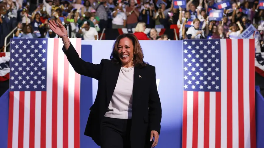 epa11600958 Vice President and Democratic presidential nominee Kamala Harris takes to the stage as she participates in a campaign rally at the Bojangles Arena in Charlotte, North Carolina, USA, 12 September 2024. Harris is running against former US President and Republican nominee Donald Trump. EPA/ERIK S. LESSER