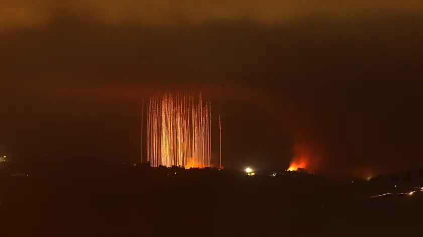 epa11634329 Israeli artillery shells hit areas near villages in southern Lebanon along the border with Israel, as seen from the Upper Galilee, northern Israel, 30 September 2024. Israel's military stated that it has been 'strengthening defense' along the contact line in the country's northern border as it was preparing for the 'next phases of combat'. The Israel Defense Forces (IDF) said they 'will continue to strike, harm, and degrade' Hezbollah's military in Lebanon. EPA/ATEF SAFADI
