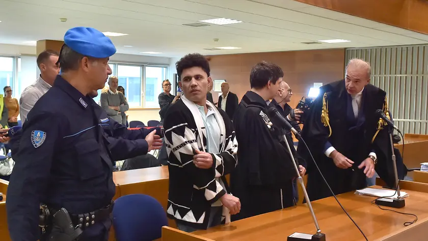 Il momento in cui il giudice Milocco legge la sentenza (Foto Petrussi)
