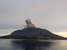 epa11288018 A handout photo made available by the Indonesian National Search and Rescue Agency (BASARNAS) shows smoke and ash erupting from Mount Ruang as seen from Tagulandang village, in North Sulawesi, Indonesia, 19 April 2024. The Center for Volcanology and Geological Disaster Mitigation (PVMBG) of the Ministry of Energy and Mineral Resources reported that Mount Ruang in the Sitaro Islands Regency, North Sulawesi, erupted on 16 April night. As a result of the eruption of Mount Ruang, 272 families, or around 828 people, were evacuated. EPA/BASARNAS HANDOUT HANDOUT EDITORIAL USE ONLY/NO SALES HANDOUT EDITORIAL USE ONLY/NO SALES HANDOUT EDITORIAL USE ONLY/NO SALES