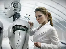 Scientist Building Robot --- Image by © Blutgruppe/Corbis