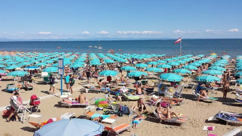 Lignano 17 Agosto 2014. Spiaggia a Pineta. © Petrussi Foto Press Srl Udine