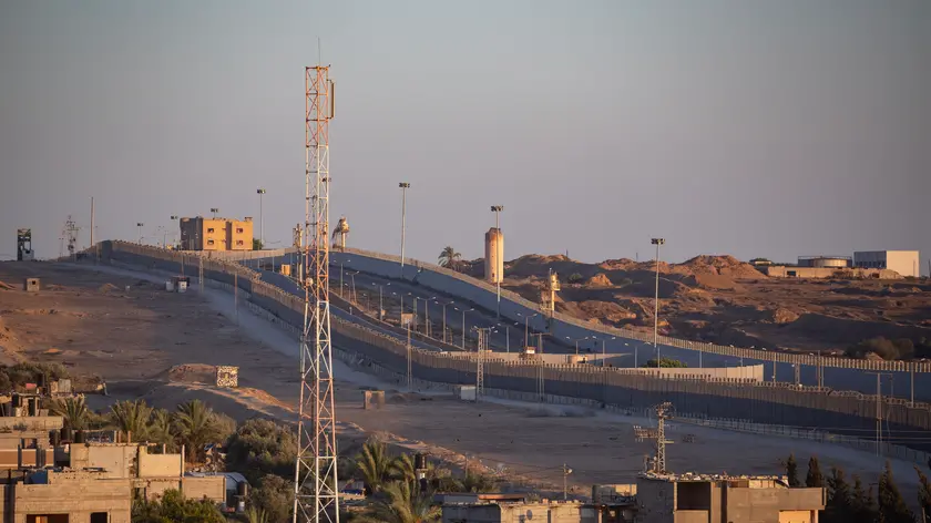 epa11367097 The border fence between the Gaza Strip and Egypt in Rafah, southern Gaza, 24 May 2024. The makeshift camp for internally displaced Palestinians previously located in the area was dismantled by Palestinians following an evacuation order by Israeli forces. The International Court of Justice (ICJ) on 24 May ordered Israel to halt its military operation in Rafah, to open the Rafah border crossing with Egypt to allow for the entry of humanitarian aid, to allow access to Gaza for investigators, and to report to the court within one month on its progress. More than 35,000 Palestinians and over 1,400 Israelis have been killed, according to the Palestinian Health Ministry and the Israel Defense Forces (IDF), since Hamas militants launched an attack against Israel from the Gaza Strip on 07 October 2023, and the Israeli operations in Gaza and the West Bank which followed it. EPA/HAITHAM IMAD