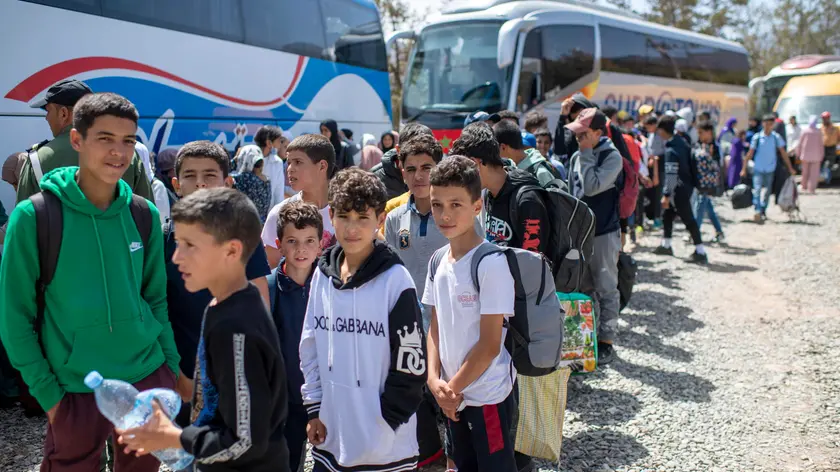 epa10869991 Students from educational institutions that were severely damaged by the earthquake in the villages of Al Haouz Province are transferred to boarding schools in Marrakesh, Morocco, 19 September 2023. Students from the villages of Ouargan, Talat Yacoub and Tanmil of Al Haouz Province, where educational institutions were severely damaged by the earthquake, are being transferred to boarding schools under the supervision of the Ministry of Interior. The 6.8 earthquake that struck central Morocco late September 08 killed nearly 3,000 people and damaged buildings from villages and towns in the Atlas Mountains to Marrakesh, according to a report by the country's Interior Ministry. EPA/JALAL MORCHIDI