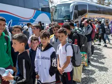 epa10869991 Students from educational institutions that were severely damaged by the earthquake in the villages of Al Haouz Province are transferred to boarding schools in Marrakesh, Morocco, 19 September 2023. Students from the villages of Ouargan, Talat Yacoub and Tanmil of Al Haouz Province, where educational institutions were severely damaged by the earthquake, are being transferred to boarding schools under the supervision of the Ministry of Interior. The 6.8 earthquake that struck central Morocco late September 08 killed nearly 3,000 people and damaged buildings from villages and towns in the Atlas Mountains to Marrakesh, according to a report by the country's Interior Ministry. EPA/JALAL MORCHIDI