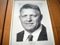 epa11359522 A portrait of Slovak Prime Minister Robert Fico is seen on the wall of the Government Office of the Slovak Republic in Bratislava, Slovakia, 22 May 2024. Slovak Prime Minister Robert Fico was shot and injured in Handlova on 15 May and transported to a hospital in a life-threatening condition; the shooting suspect was arrested on spot. EPA/JAKUB GAVLAK